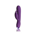 Vibrador Flutter con conejito púrpura, diseño ergonómico con doble motor para estimulación interna y de clítoris. 10 modos de vibración, recargable y resistente al agua para una experiencia de placer completa.